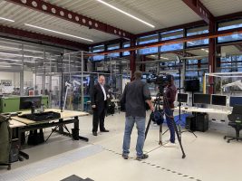 2021-11-03: FAPS laboratory hall as a scene for ARD Tagesthemen